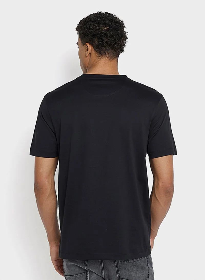 بين شيرمان تيشيرت قطن ميرسرايز بطبعة على الصدر